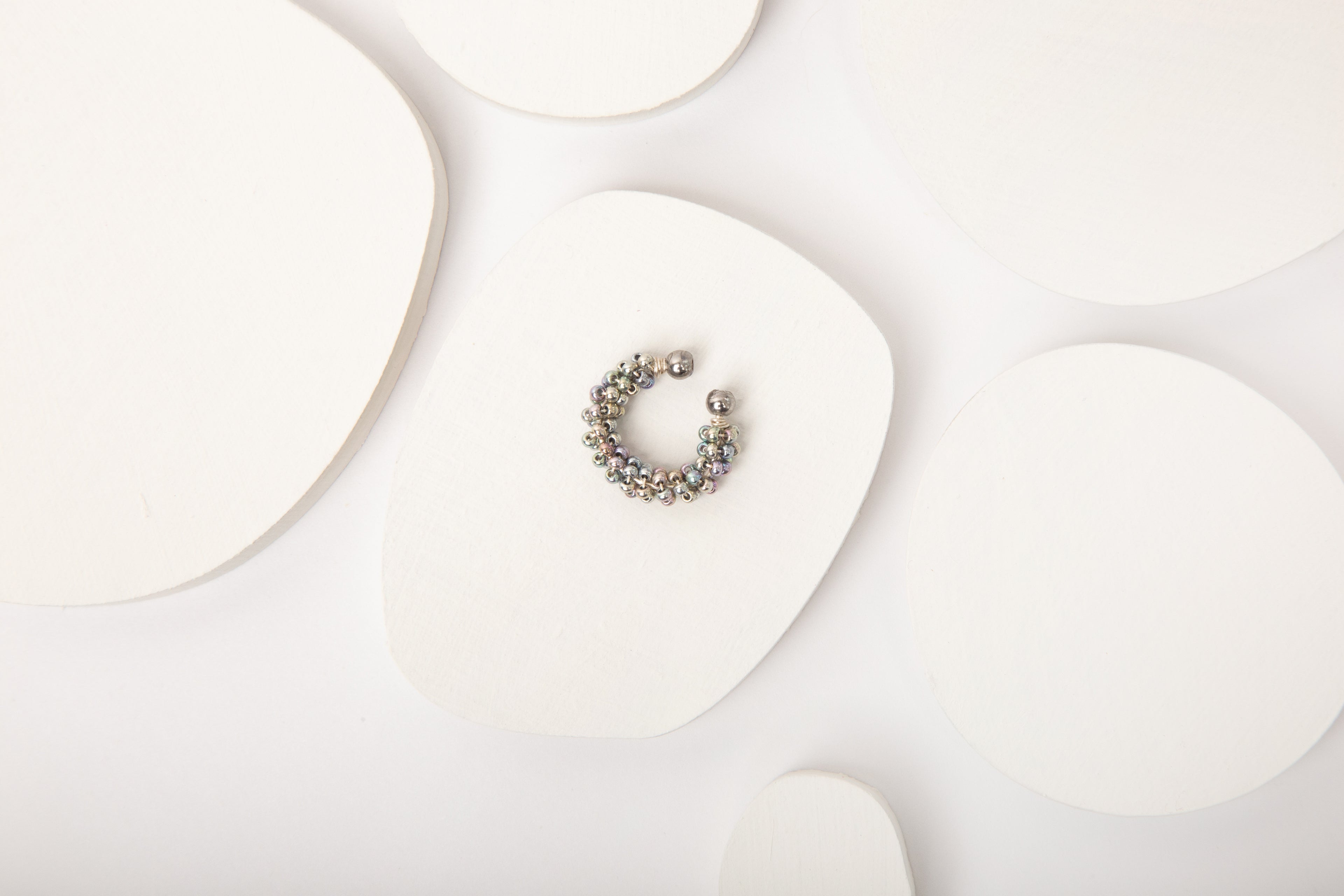 EARCUFF CUBIERTO MOSTACILLAS